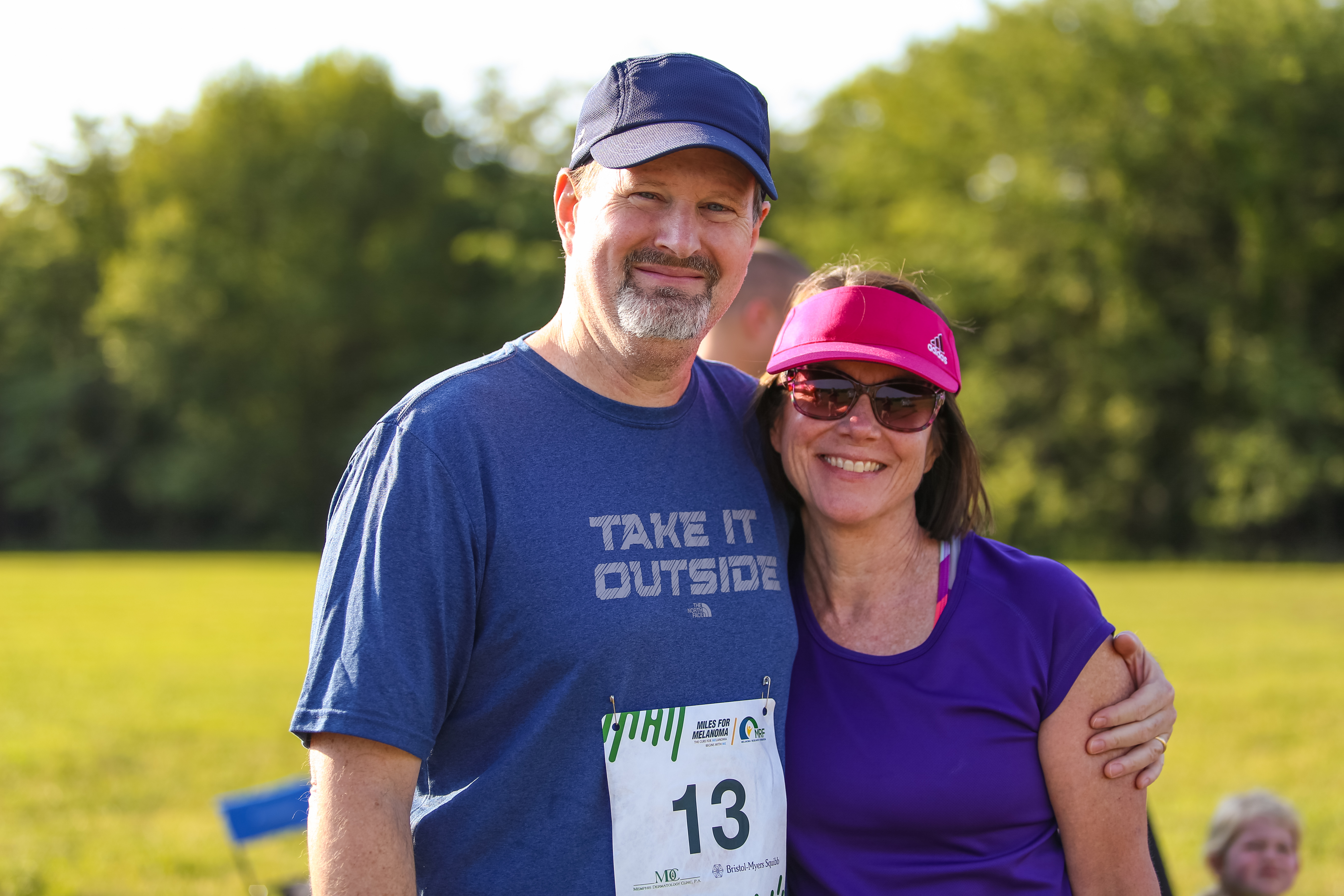 The author and his wife smiling in running clothes
