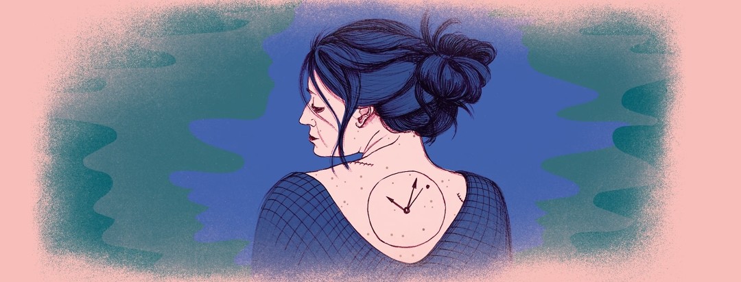 a woman glances over her shoulder at a clock tattoo on her back. The clock hands point to an odd mole.