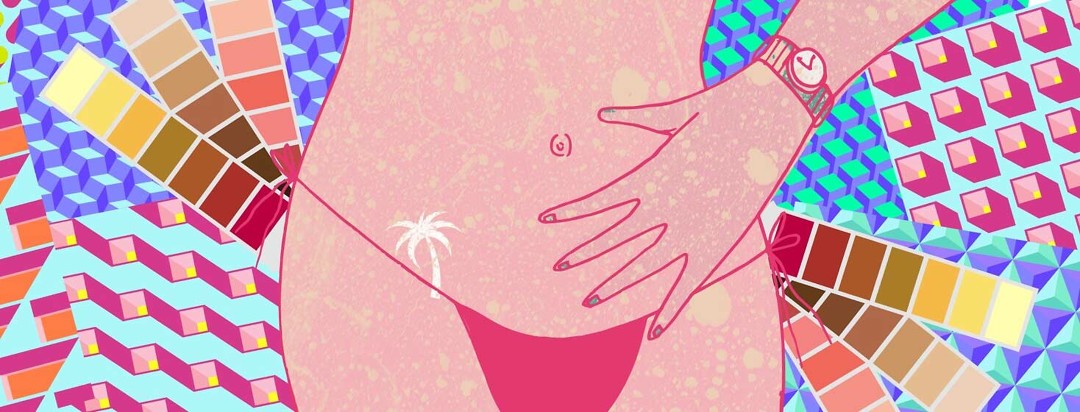 a woman's midsection showing a tiny white palm tree where they put a sticker to judge how tan the skin is getting