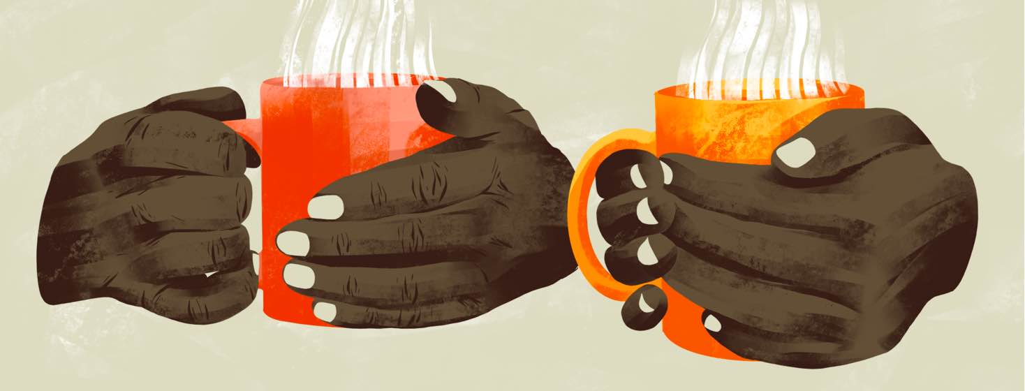 Two sets of hands each hold a mug full of a steaming beverage.