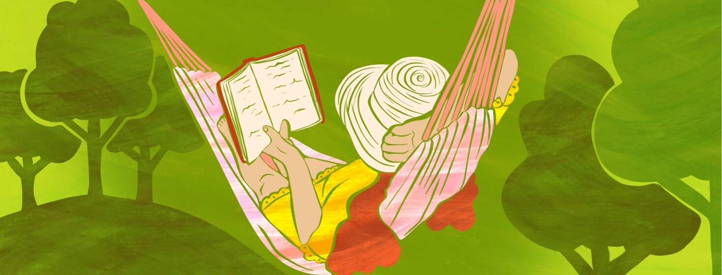 A woman peacefully lies in a hammock in a serene nature setting while reading a book