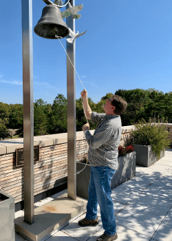 Ken Billett rings the bell to announce end of cancer treatment